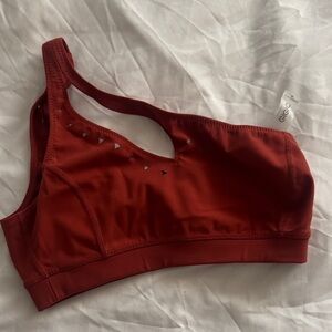 GIGI C Rust Red Asymmetric Sports Bra with Triangle Cutouts